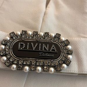 Wide Leg Jumpsuit . Open back details. Jewelry belt.